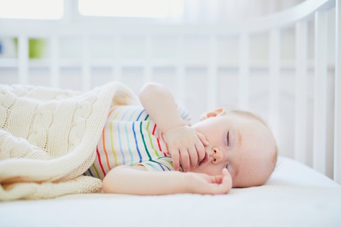 Decorative: Baby Sleeping In A Crib