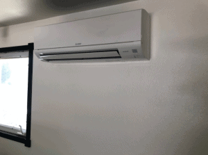 Air Handler Installed On The Inside Of An Exterior Wall Of A Garage
